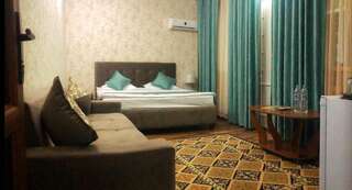 Отель Rich Hotel Бишкек Улучшенный четырехместный номер-1